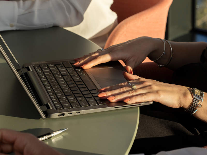 Person typing on a laptop
