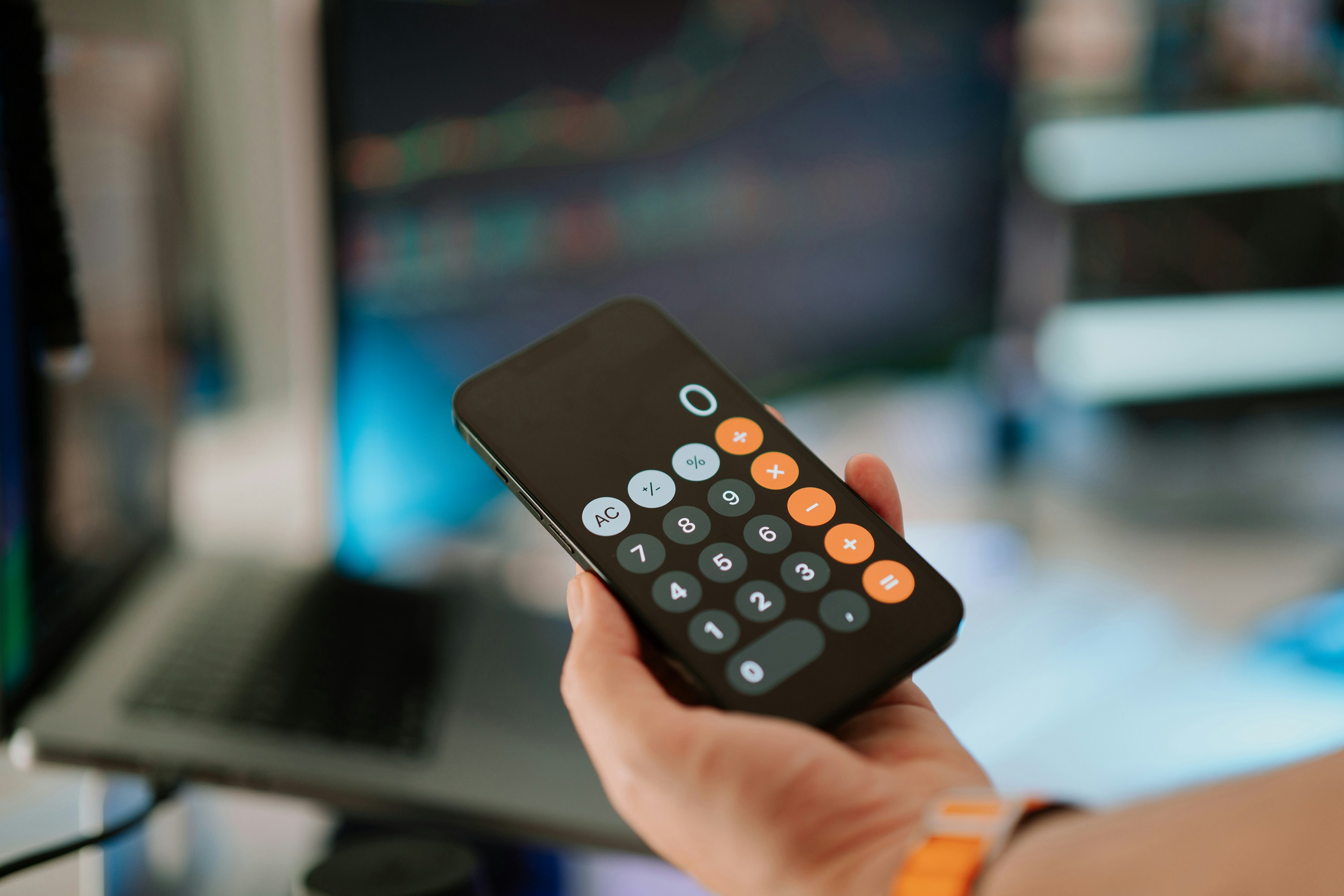 Smartphone calculator used to illustrate debt repayment calculations and financial arrears. Accompanies an article on Time to Pay Directions, Time to Pay Orders and Time Orders under Scottish debt recovery and consumer credit law.