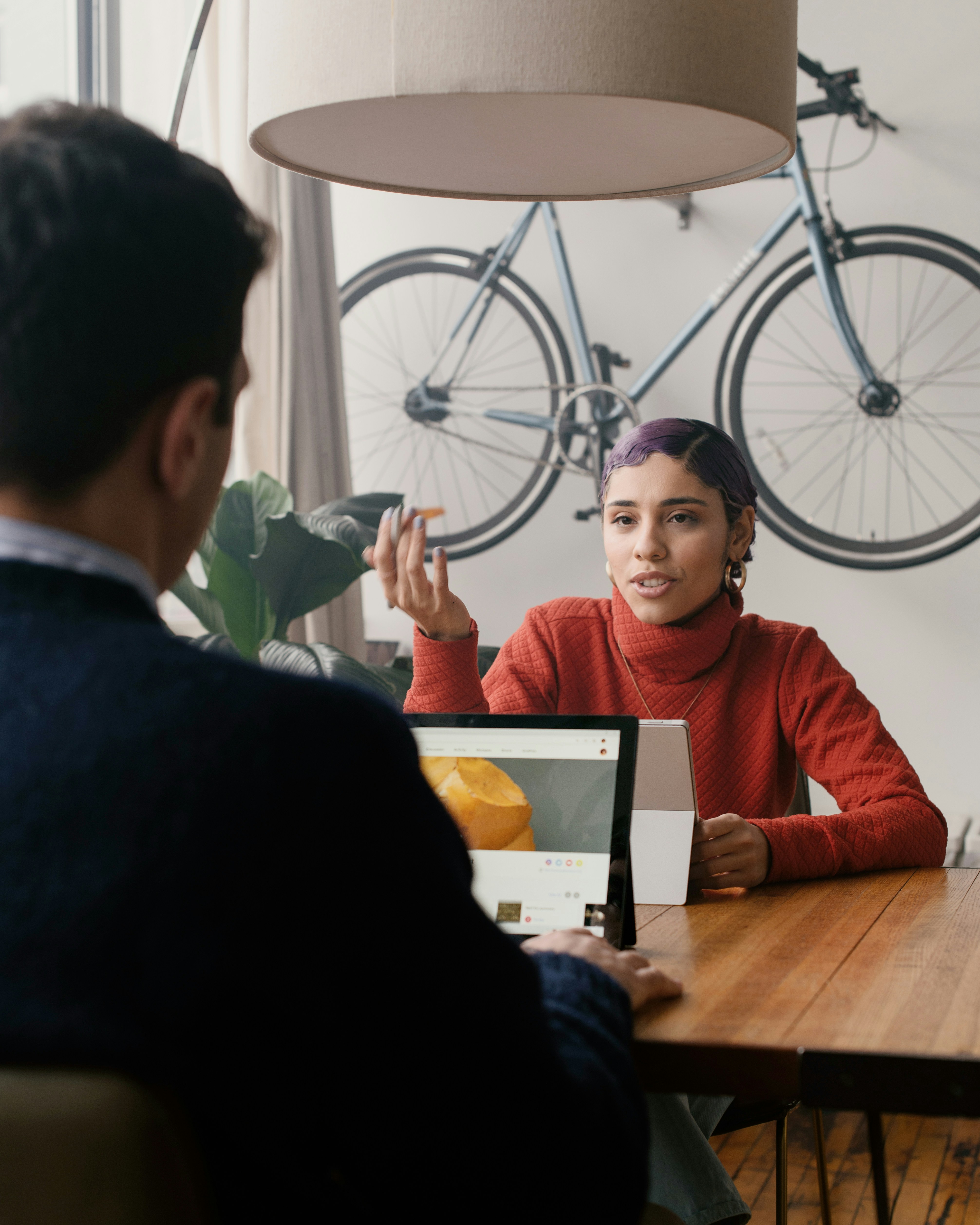 Employees discussing work in an office environment, illustrating equal treatment and legal protections for part-time workers.