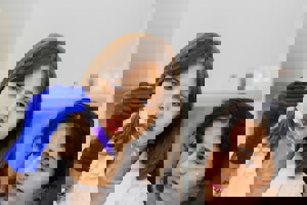 Life sciences researchers analysing a sample in a laboratory setting.