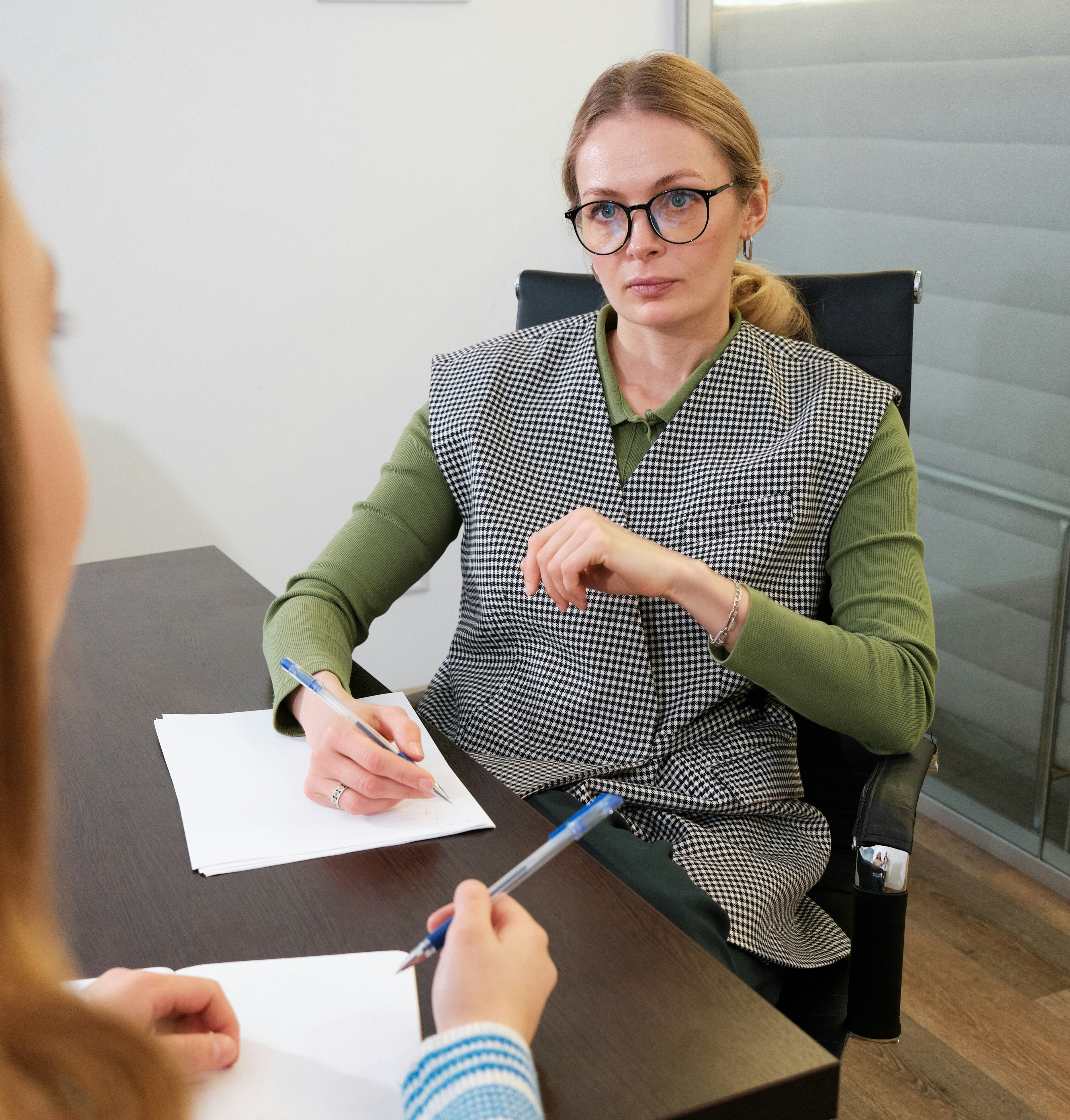 Workplace meeting between an employee and manager discussing disciplinary or grievance matters and employee rights.